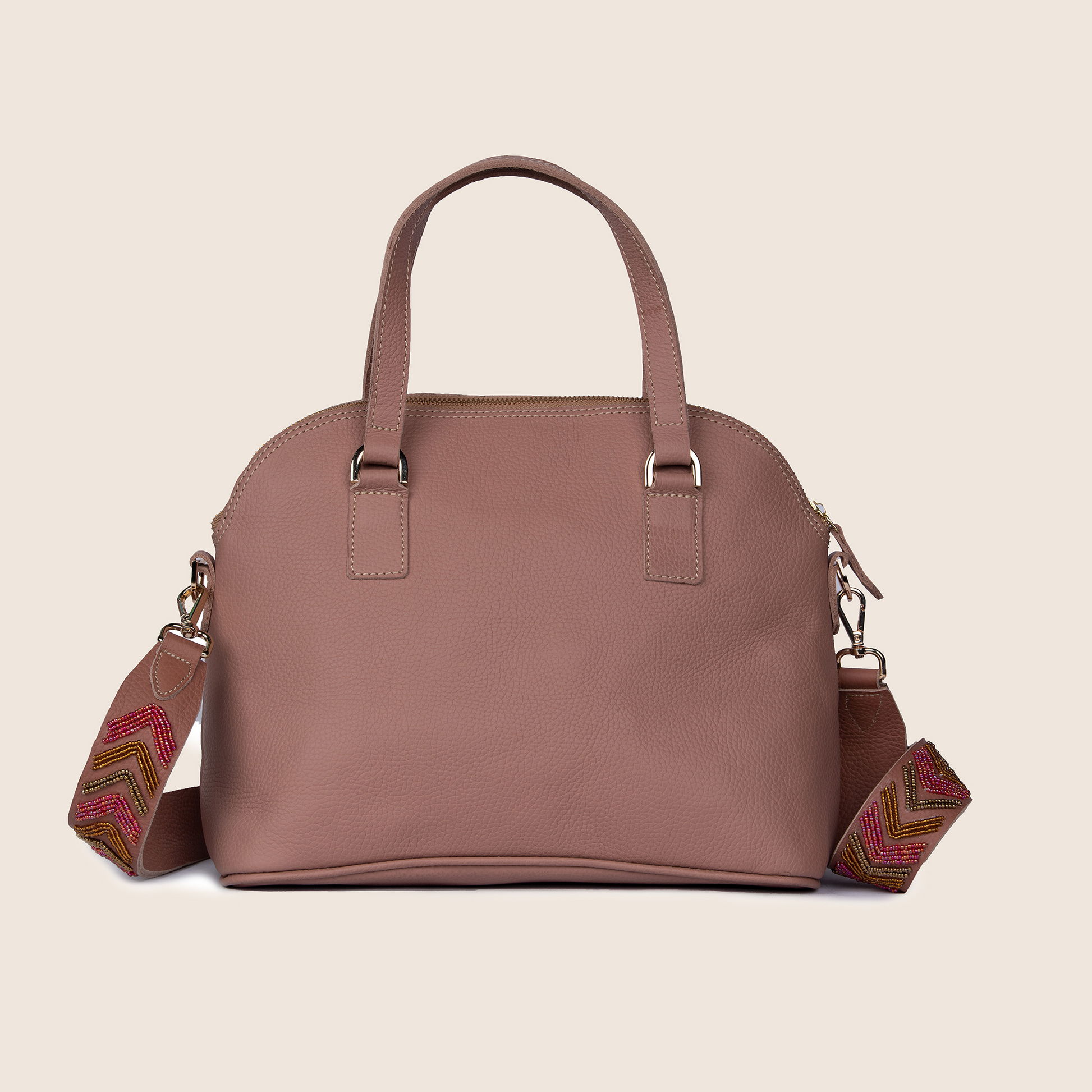 Spade bag in nude milled leather and with Maasai beaded adjustable shoulder strap