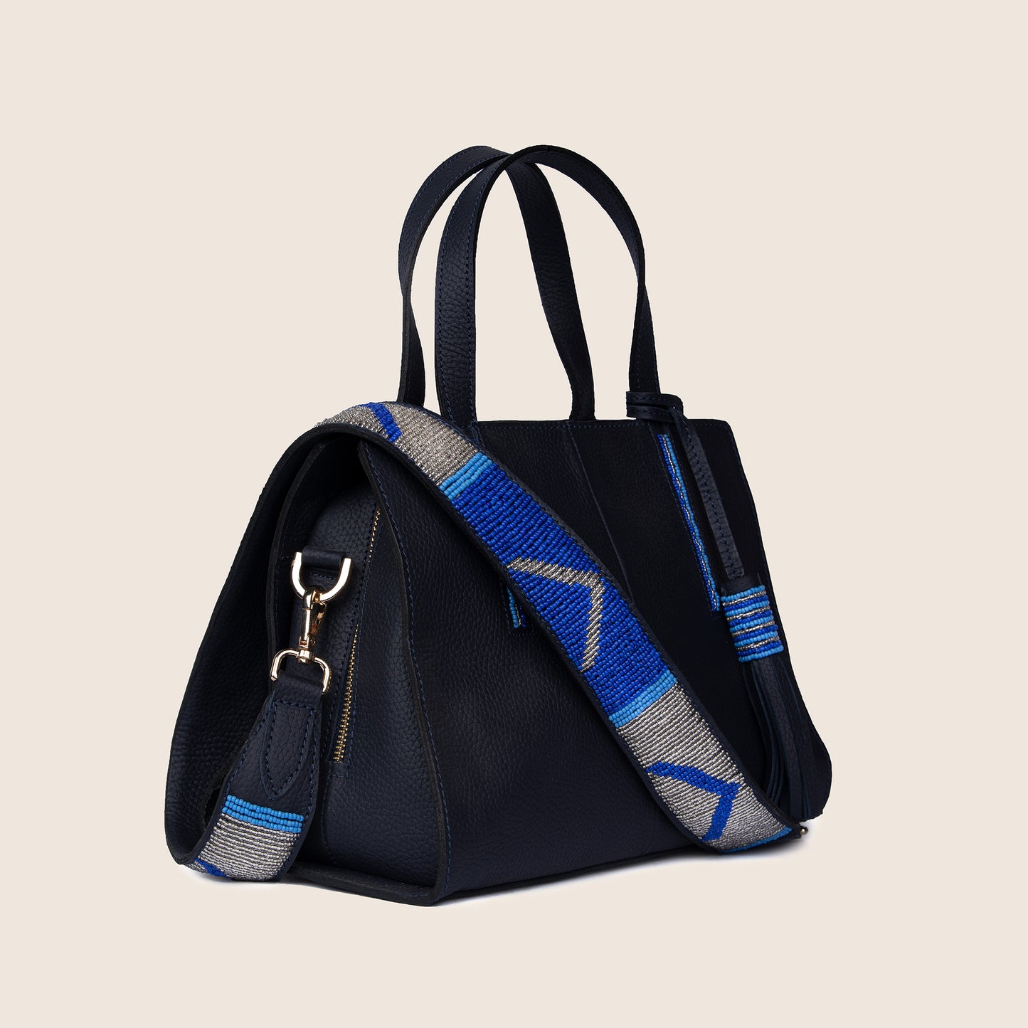 Kate bag in Navy blue milled leather and with Maasai beaded strap.